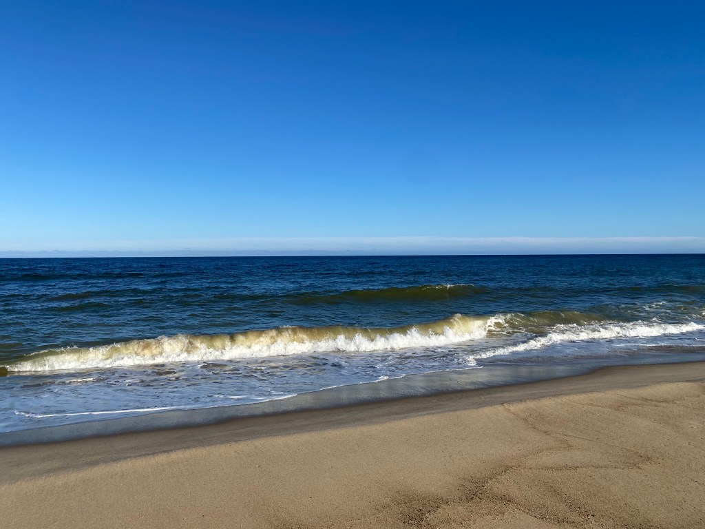 ocean crashing onto a beach