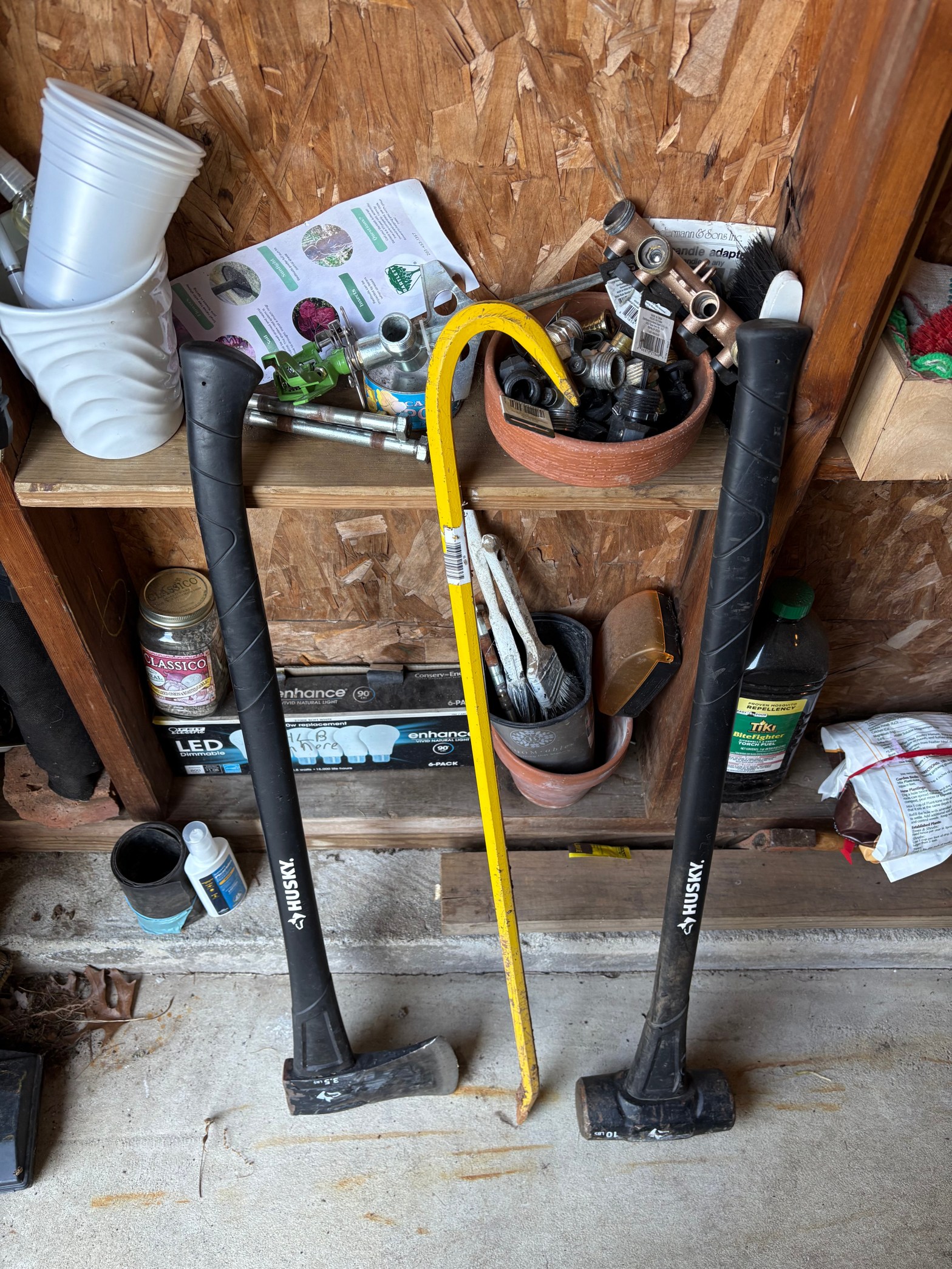 An axe, a crowbar, and a sledgehammer